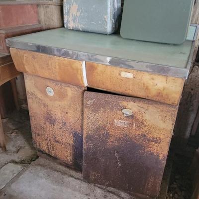 Enameled cabinet...drawers and doors work great. Ready to be refinished