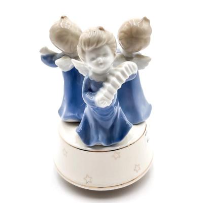 Sale Photo Thumbnail #141: Ceramic Blue & White Angel Children Trio Figurine Music Box