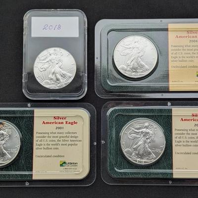 4 1oz Silver Eagles 2001, 2002, 2004, & 2018