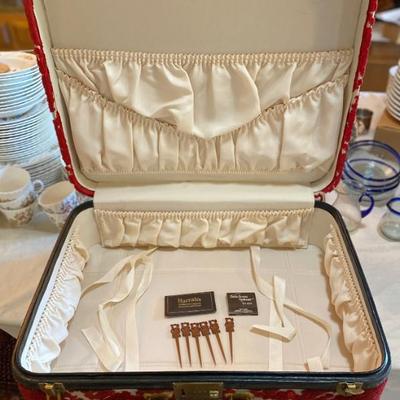 Sale Photo Thumbnail #87: Rare find! vintage 1950s ladies suitcase. Red velvet burn-out with contrasting black piping, lined with ivory satin, and crossgrain ribbons. 