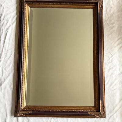 Ornate Mirror with Gilded Accents