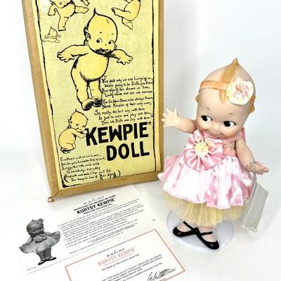 The Danbury Mint Porcelain Kurtsy Kewpie Doll with Stand and Box