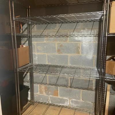 2 shelving units with 4 shelves