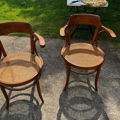 bentwood armchairs with a caned seats 