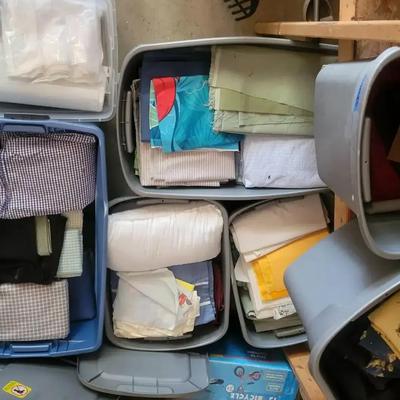 Seven Storage Bins of Assorted Fabrics