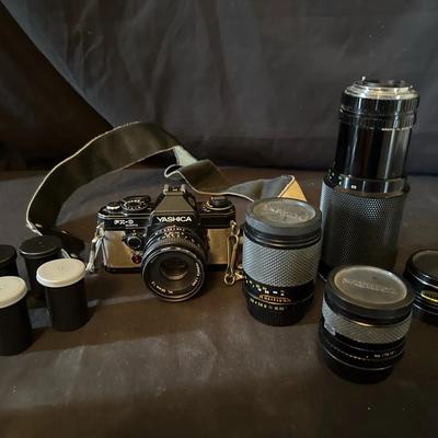 Lot 229: Yashica FX-D Quartz 35mm SLR 4 Lens And Accessories 
