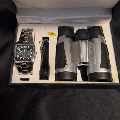 Lot 505: Alain Miller Quartz Watch Gift Set w/ Binoculars & Flashlight