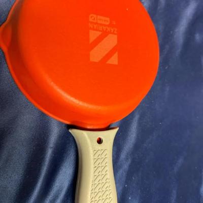 Lot 575: Zakarian by Dash Mini Cast Iron Skillet – Red Enamel with Grip Handle