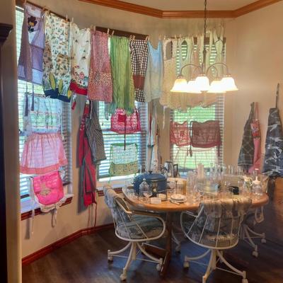 Lots of beautiful vintage aprons