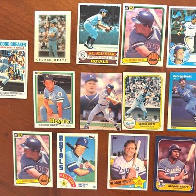 13 George Brett Baseball Cards from the late 70s and early 80s.