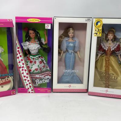 German, Mexican, Sagittarius, and Princess of Holland Barbie Dolls