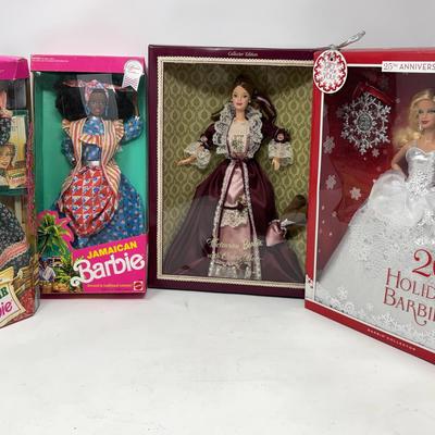 Pioneer, Jamaican, Victorian, and 2013 Holiday Barbie Dolls