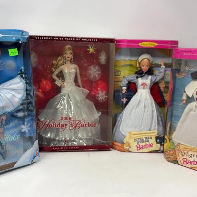 Snowflake, 2008 Holiday Barbie, Civil War Nurse, and Pilgrim Barbie Dolls