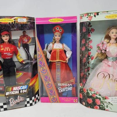 Nascar Official #94, Russian, and Rose Barbie Dolls