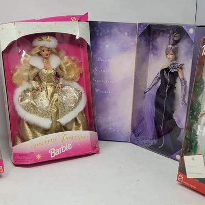 Arctic, Winter Fantasy, Sterling Silver Rose, and Holiday Joy Barbie Dolls