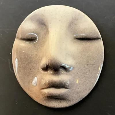 Face Brooch