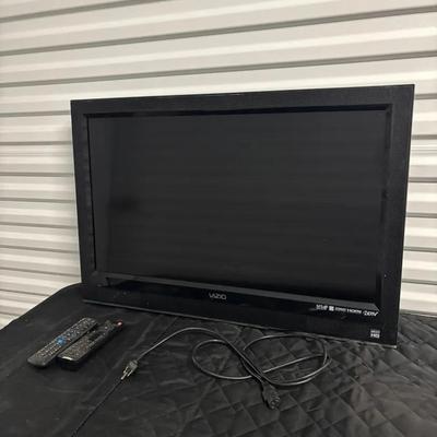 Vizio Tv And Tv Stand With Remotes 