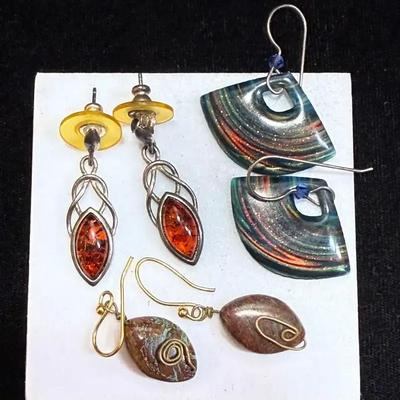 Three contemporary sets of earrings