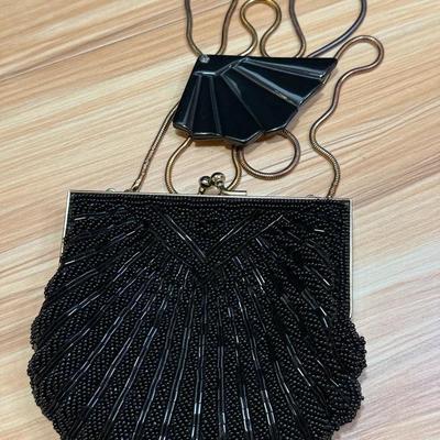 Walborg clutch purse with black fan mirror