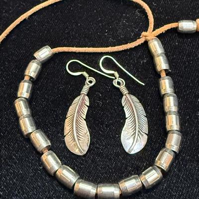 Rc sterling stamped feather earrings