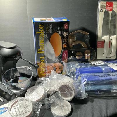 Knives, Wine Opener, Perfect Pancake, And Wrap/foil Storage 