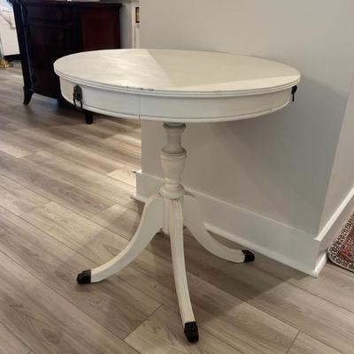 Sale Photo Thumbnail #121: Painted drum table with lion head rings.