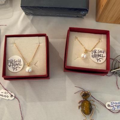 2 14k gold chains with pearl pendant. 