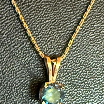 14k Gold 17 Inch Necklace With Blue Topaz Pendant - Weight 3 Grams