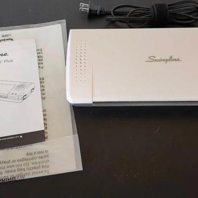 Swinging Laminator