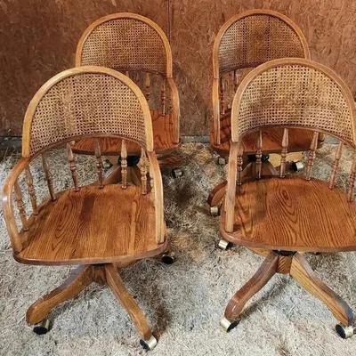 Vintage Set of 4 Oak Swivel Cane Back Chairs