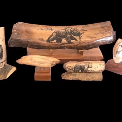 Collection of Scrimshaw etchings into wood 