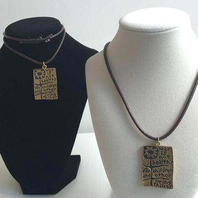 War Is Not Healthy Pendants