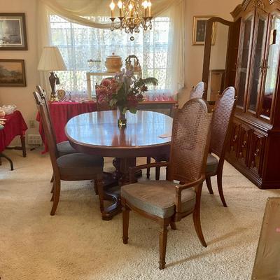 Dining table and 8 chairs has two leaves, buy it now $200