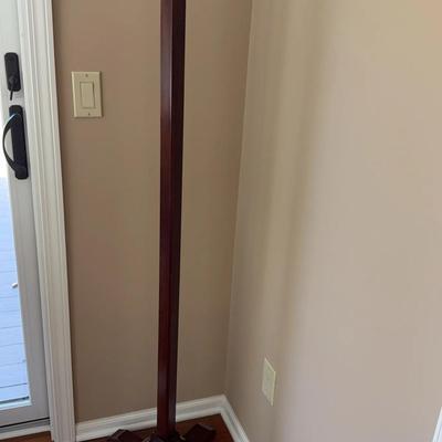 Cherry colored coat stand with antique brass hooks