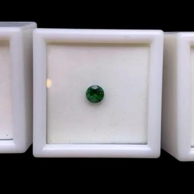 Tsavorite Garnets: 0.35CT 6x4mm Oval, 0.55CT 5.5mm Round And Two Unknown Size/Wt Rounds
