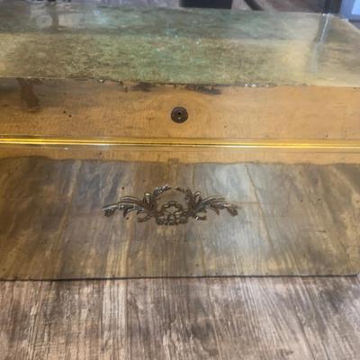 Wooden Chest Covered In Gold Metal Sheeting