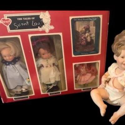 The Ashton Drake galleries cute as a button, porcelain baby doll, and the tales of silent Lou s u set
