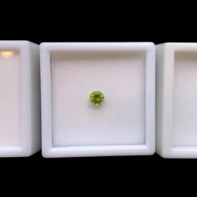 Demantoid Garnets: One (1) 0.45CT 5mm Round And Two (2) 0.20CT 4mm Round