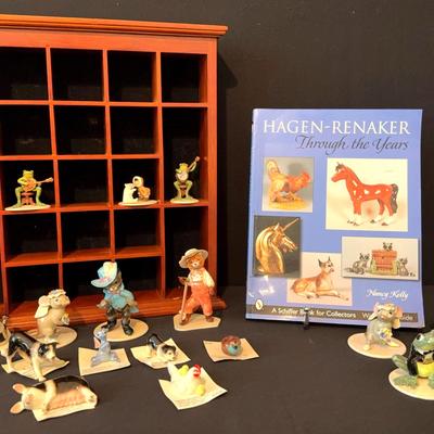 Collection of Hagen-Renaker figurines with book & display shelf 
