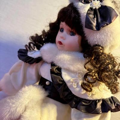 Porcelain Doll in White & Navy Winter Outfit