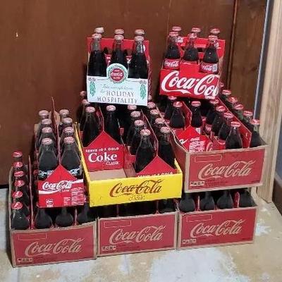 Collection of Full Coca-Cola Bottles 