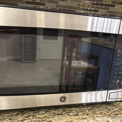 Green and Stainless GE Microwave Oven with Original Paperwork - Like New!