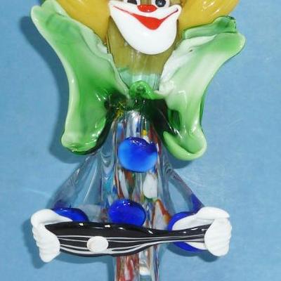several Murano glass clowns