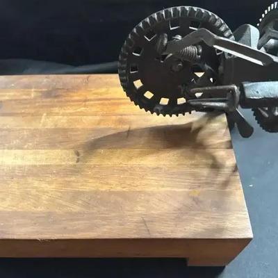 Lot 106:  Antique Cast Iron Gear-Driven Apple Peeler on Wooden Base