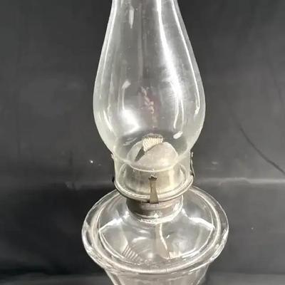 Lot 120:  Vintage Clear Glass Oil Lamp with Chimney and Brass Burner
