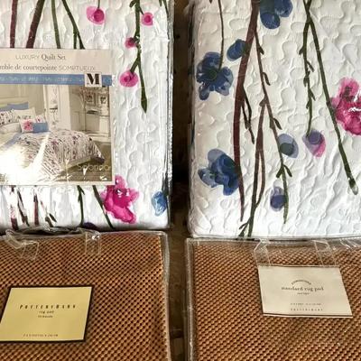 Lot 134:  Twin Quilts And Two Rug Pads