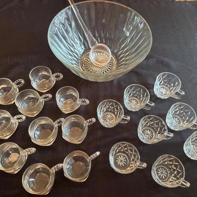 Lot 210: Glass Cut Punch Bowl With Ladle And 18 Assorted Cups 