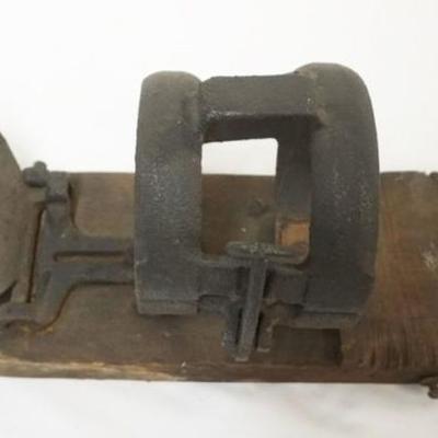 Sale Photo Thumbnail #128: 1128	ANTIQUE CAST IRON ASPARAGUS BUNCHER *CRANBELL BUNCHER PHILIA*, APPROXIMATELY 12 IN X 5 IN X 6 IN
