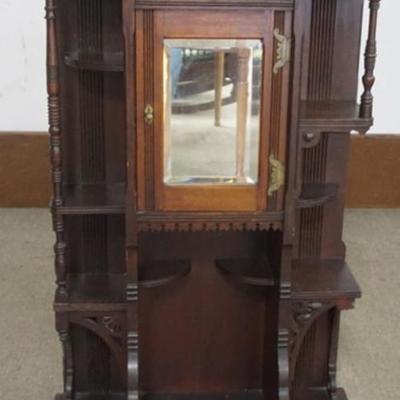Sale Photo Thumbnail #211: 1211	VICTORIAN CARVED WALNUT ETEGERIE WITH MIRROR CENTER DOOR, APPROXIMATELY 30 IN X 29 IN X 50 IN H
