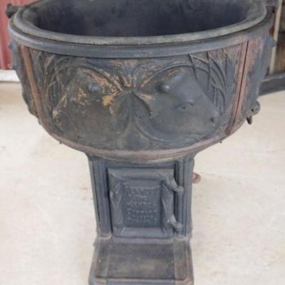 Sale Photo Thumbnail #153: 1153	KENWOOD THE WETTTRLE CO., CAST IRON LARD RENDERING KETTLE STOVE, FRONT FOOT BROKE AND MISSING, APPROXIMATELY 30 IN X 33 IN X 32 IN H
